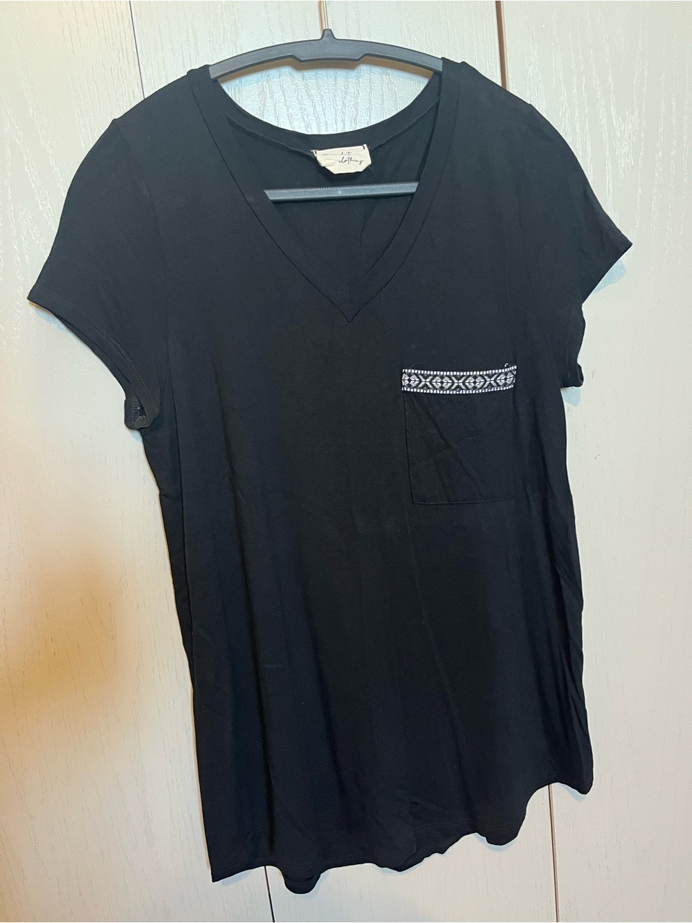 Women’s Black V‑Neck Short Sleeve Tee with Embroidered Pocket Trim